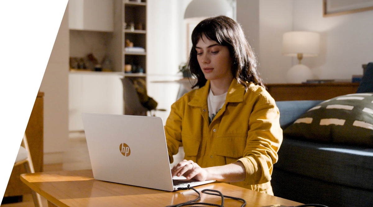 HP laptop in a home workspace